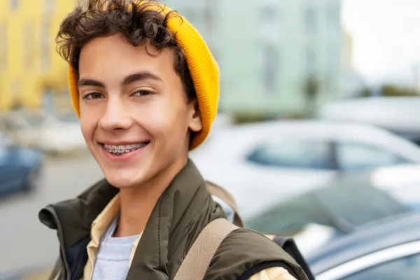 teenager smiling with braces photo